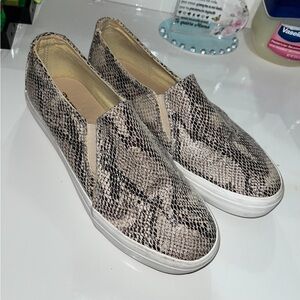 Restricted Snakeskin design slip ons